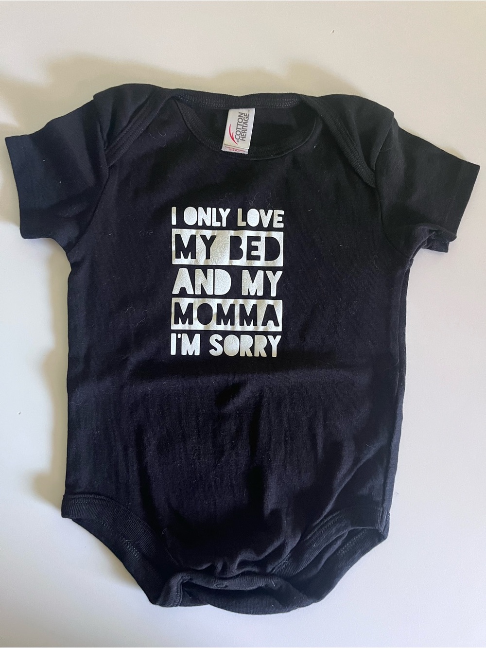 Black Baby One-Piece with White Graphic Text